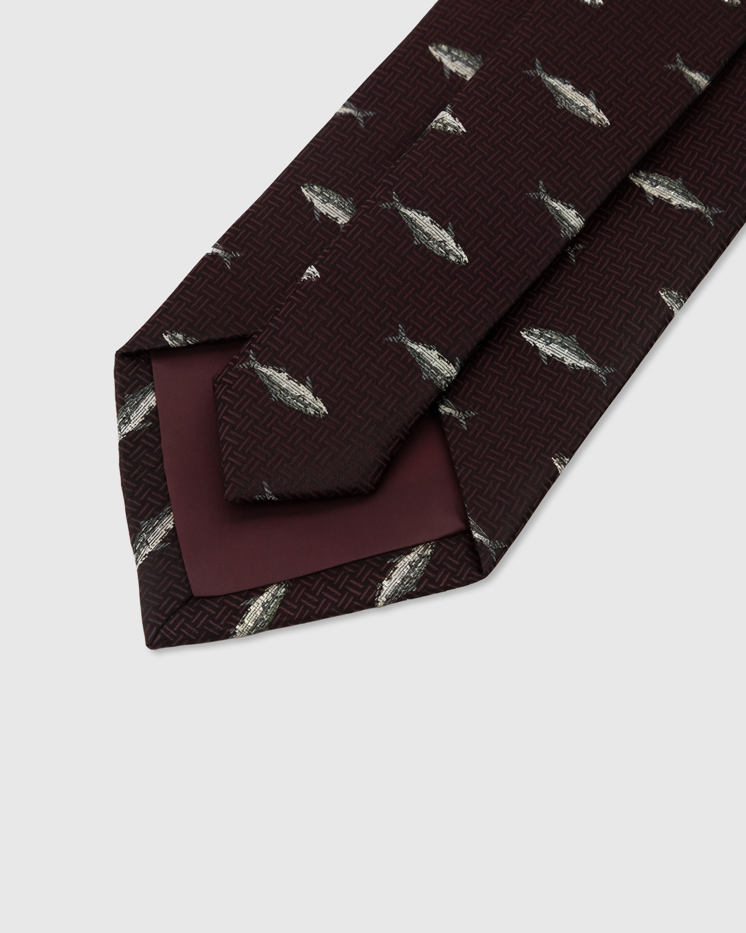 STICKYZOO Burgundy Trout Tie back detail showing structured interlining and hand-finished slip stitching, 145 x 8 cm