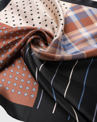 Close-up of the four-pattern patchwork printed in archival inks on pure silk
```