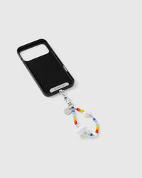 Inside of phone case showing STICKYZOO Phone Strap Card with rainbow cloud strap attached