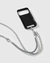 Pewter strap clipped to a black phone case for hands-free carry