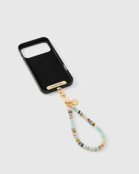 Inside of phone case showing STICKYZOO Phone Strap Card with aqua agate strap attached