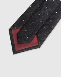 {Hand-finished interior} STICKYZOO CHARCOAL PIN DOT TIE back detail showing structured interlining and hand-finished slip stitching, 145 x 8 cm