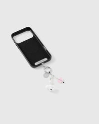 Beaded wrist strap with white cloud bead and pink jelly heart draped over a black phone case, clipped to a silver-tone ring.