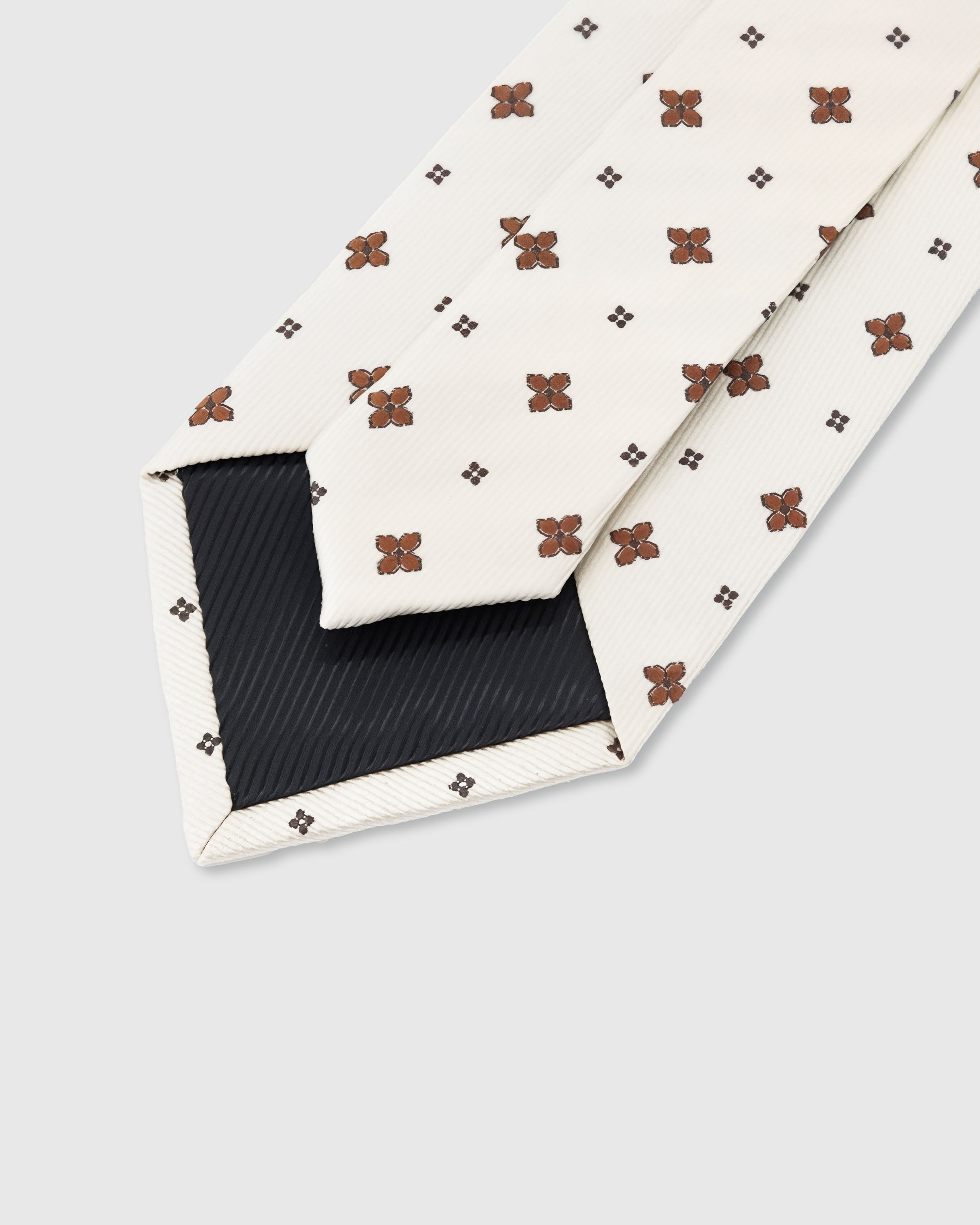 STICKYZOO Ivory Clover Tie — 45° bias-cut Italian method, structured interlining, hand-finished interior