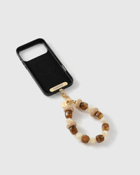 Toffee bead strap attached to a phone case with the included Phone Strap Card