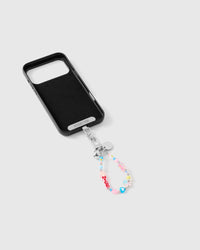Inside of black phone case showing STICKYZOO Phone Strap Card with flower cluster strap attached