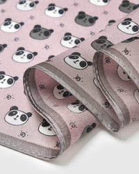 Close-up of hand-illustrated panda heads printed in archival ink on blush pink silk