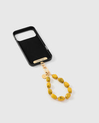 Inside of phone case showing STICKYZOO Phone Strap Card with saffron agate strap attached