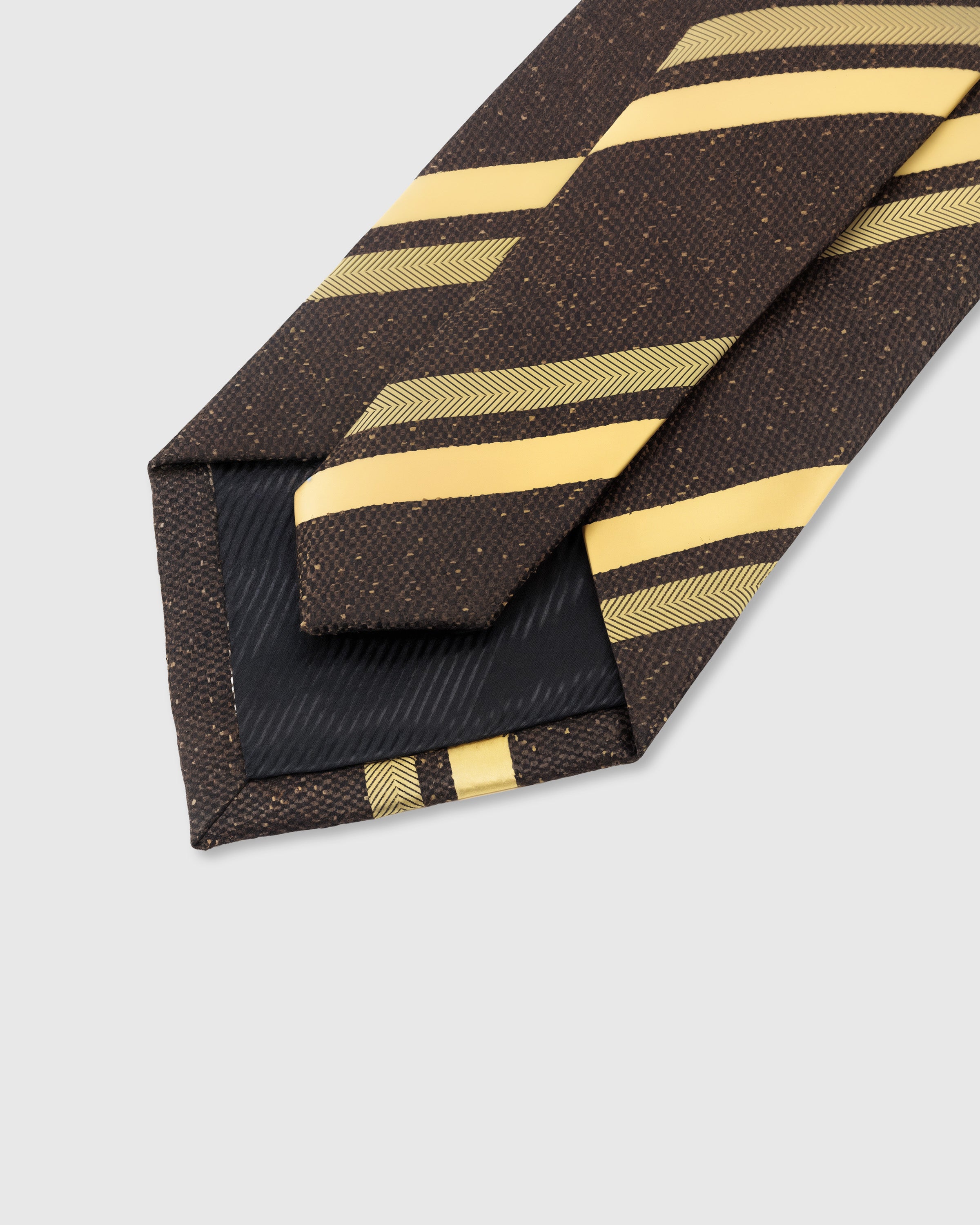 STICKYZOO Espresso Gold Stripe Tie interior detail showing structured interlining and hand-finished slip stitching, 145 × 8 cm