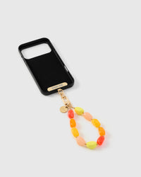 Inside of phone case showing STICKYZOO Phone Strap Card with citrus agate strap attached