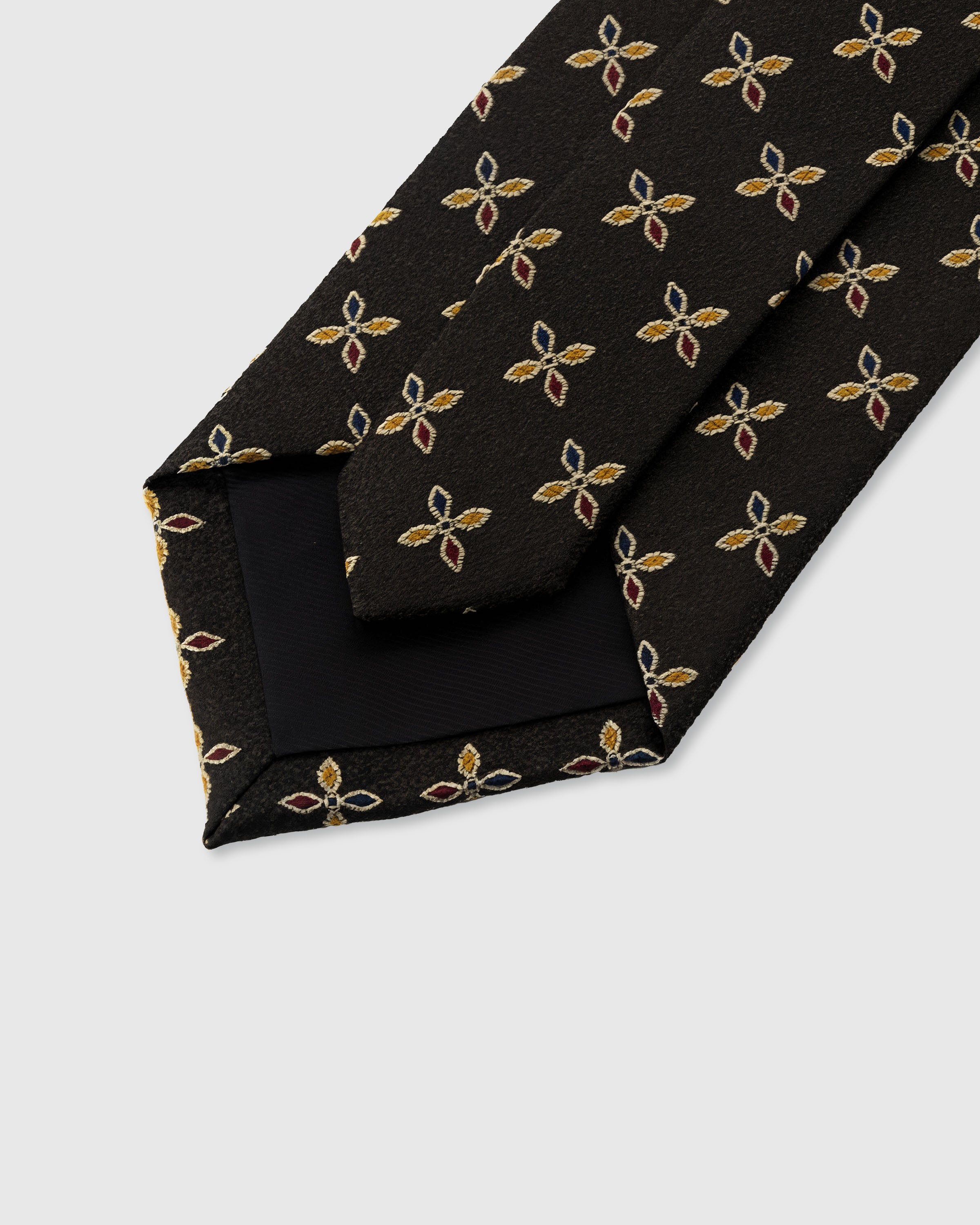 STICKYZOO ONYX PETAL TIE — 45° bias-cut Italian method, structured interlining, rated 4.9★