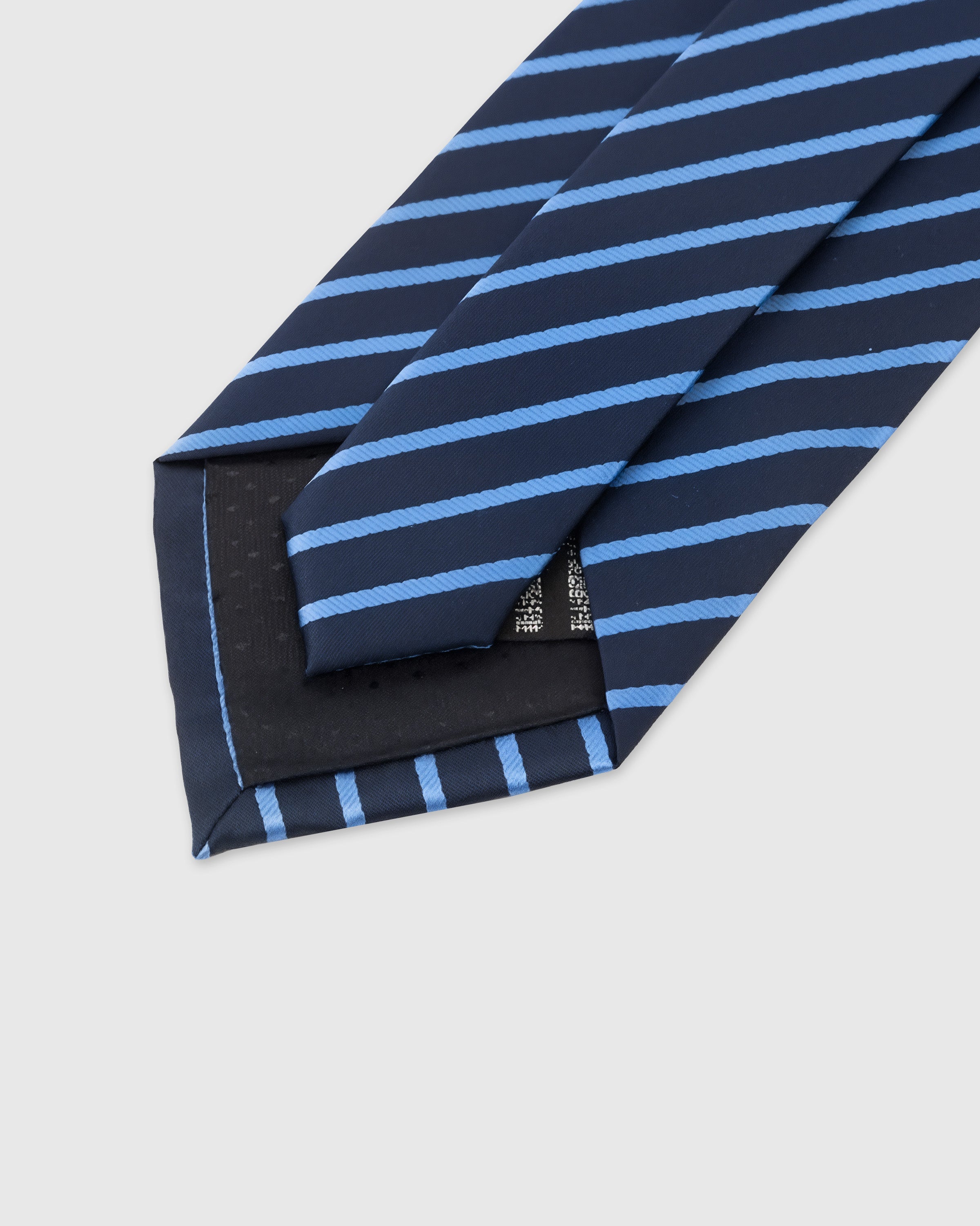 STICKYZOO Navy Sky Stripe Tie back detail showing structured interlining and hand-finished slip stitching, 145 x 8 cm