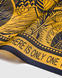 Close-up of the hand-illustrated palms and woodcut border lettering printed on pure silk
