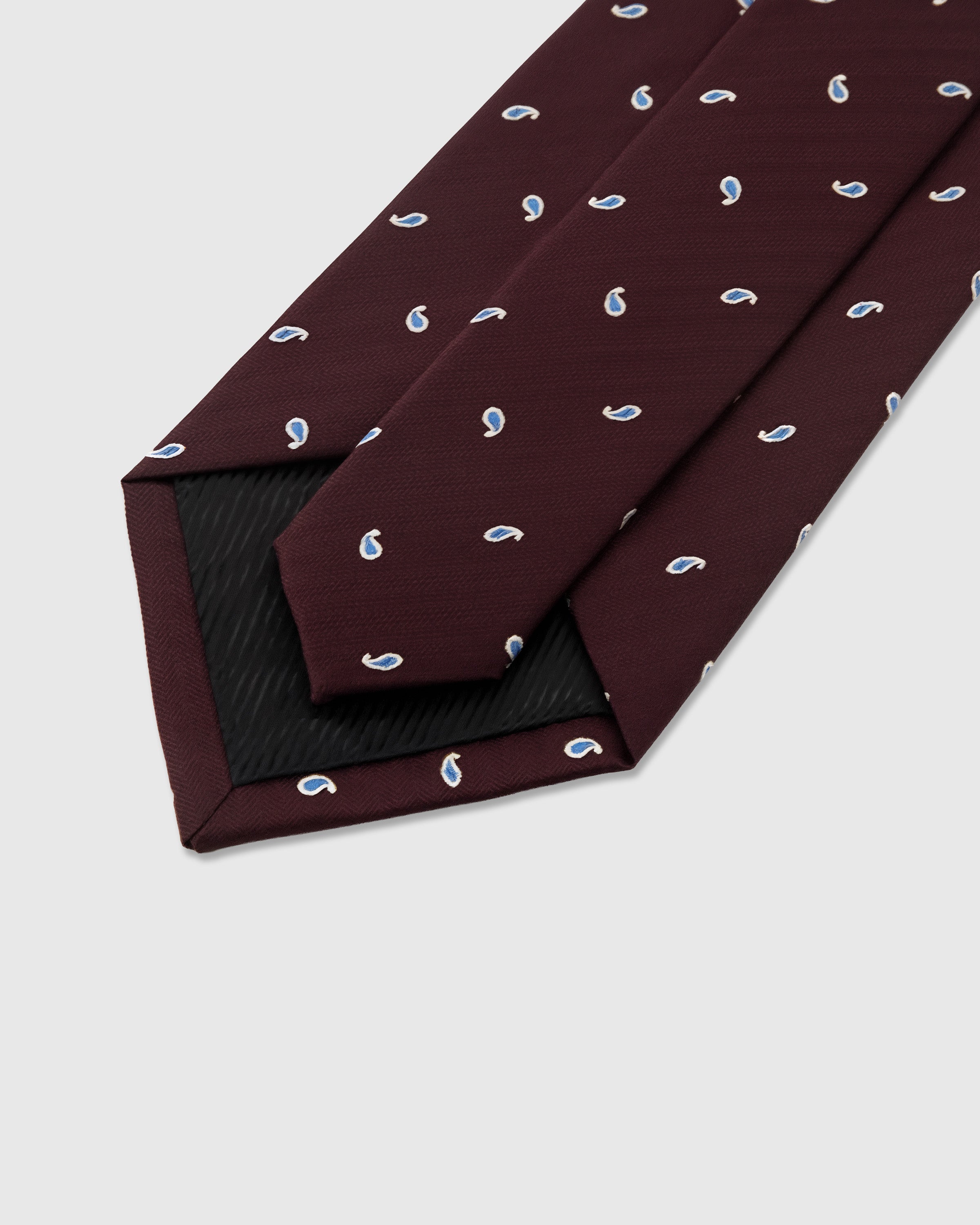 STICKYZOO Burgundy Paisley Drop Tie showing structured interlining and dimensional knot, 145 x 8 cm