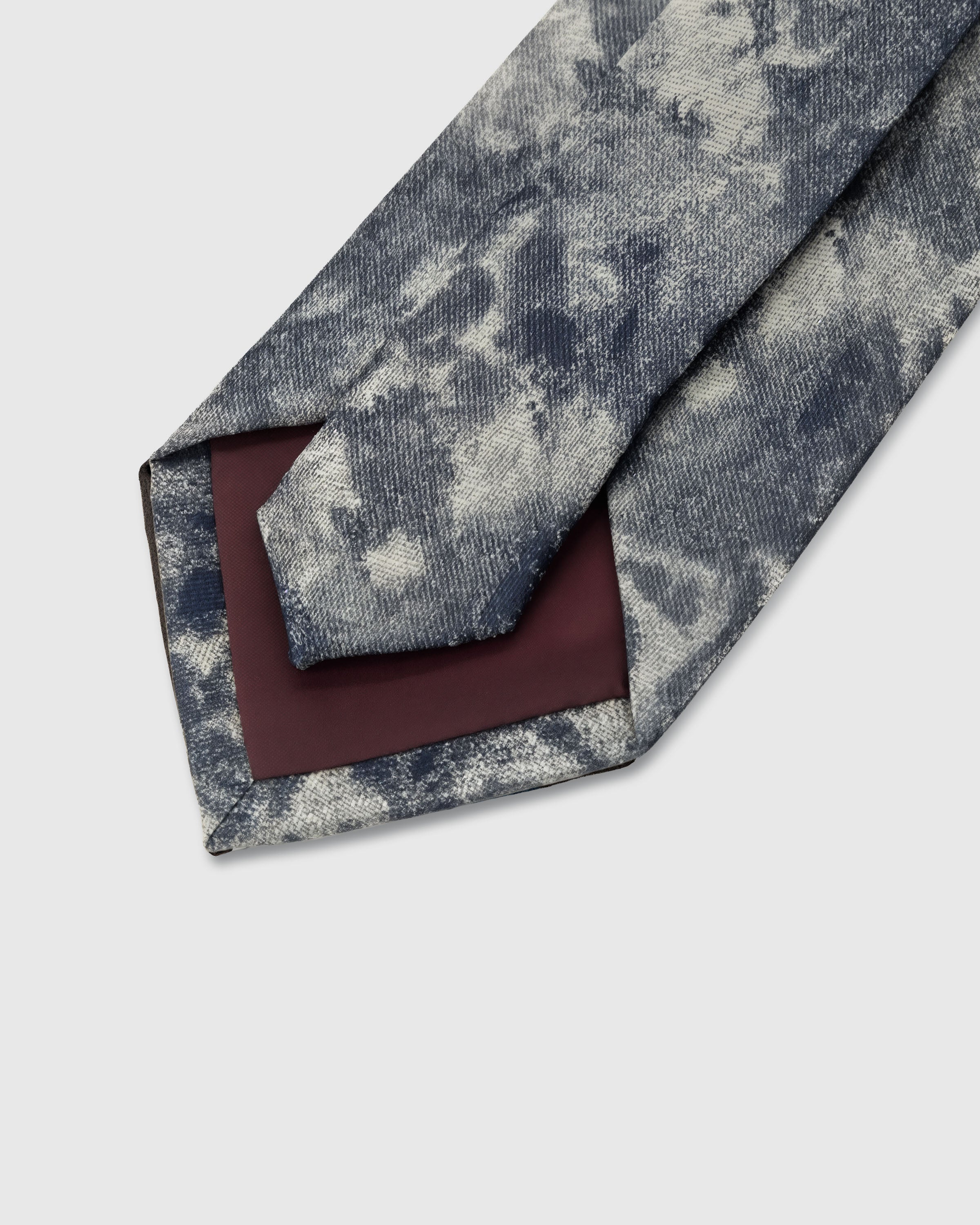 {Hand-finished interior} STICKYZOO STORM MARBLE TIE back detail showing structured interlining and hand-finished slip stitching, 145 x 8 cm