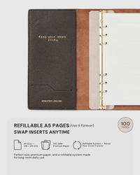 STICKYZOO notebook open showing refillable A5 ring system, 100 GSM premium paper, 148 x 210 mm, swap inserts anytime