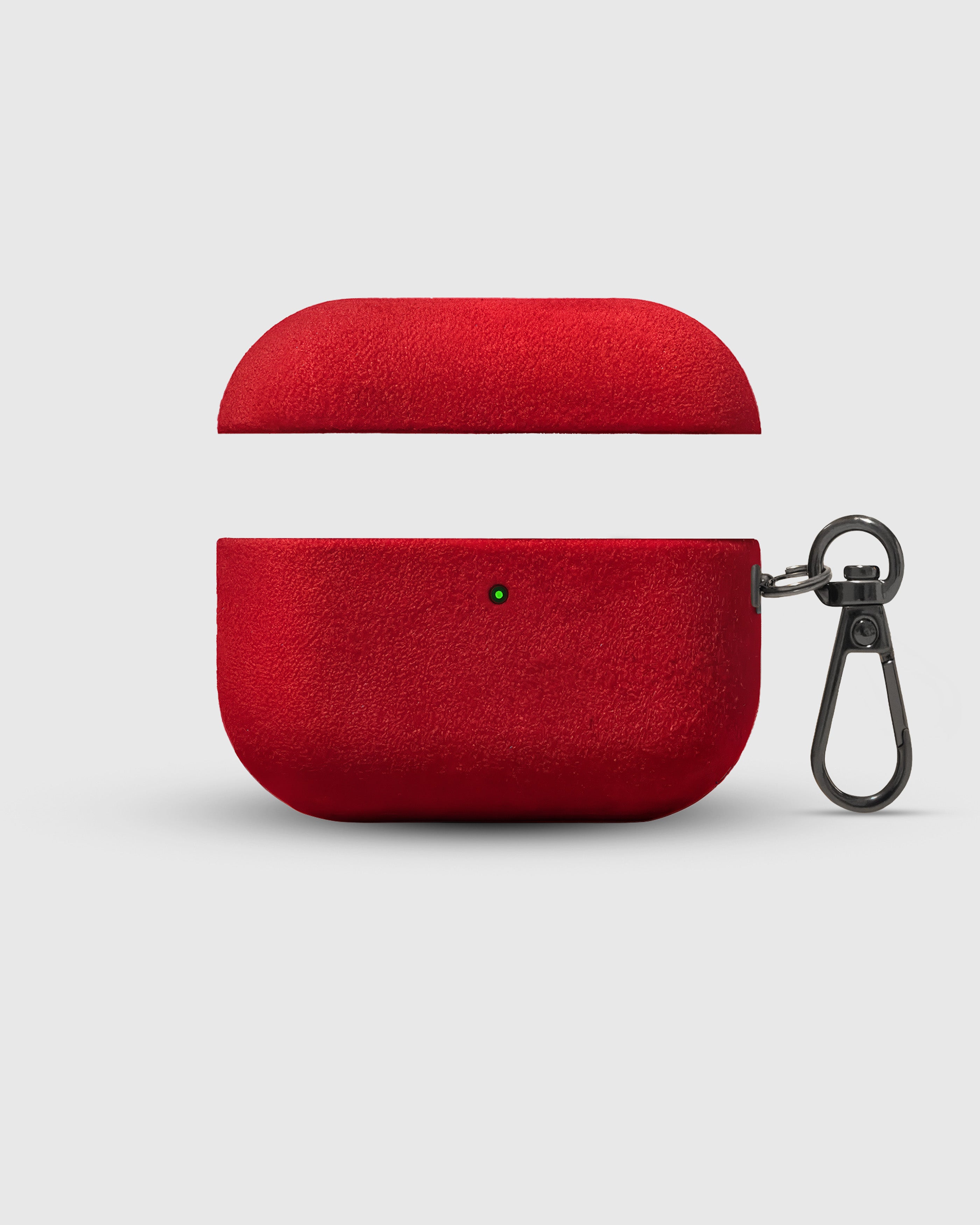 {{Not silicone — real Alcantara.}} STICKYZOO red Alcantara case open showing TPU base and microfiber suede interior