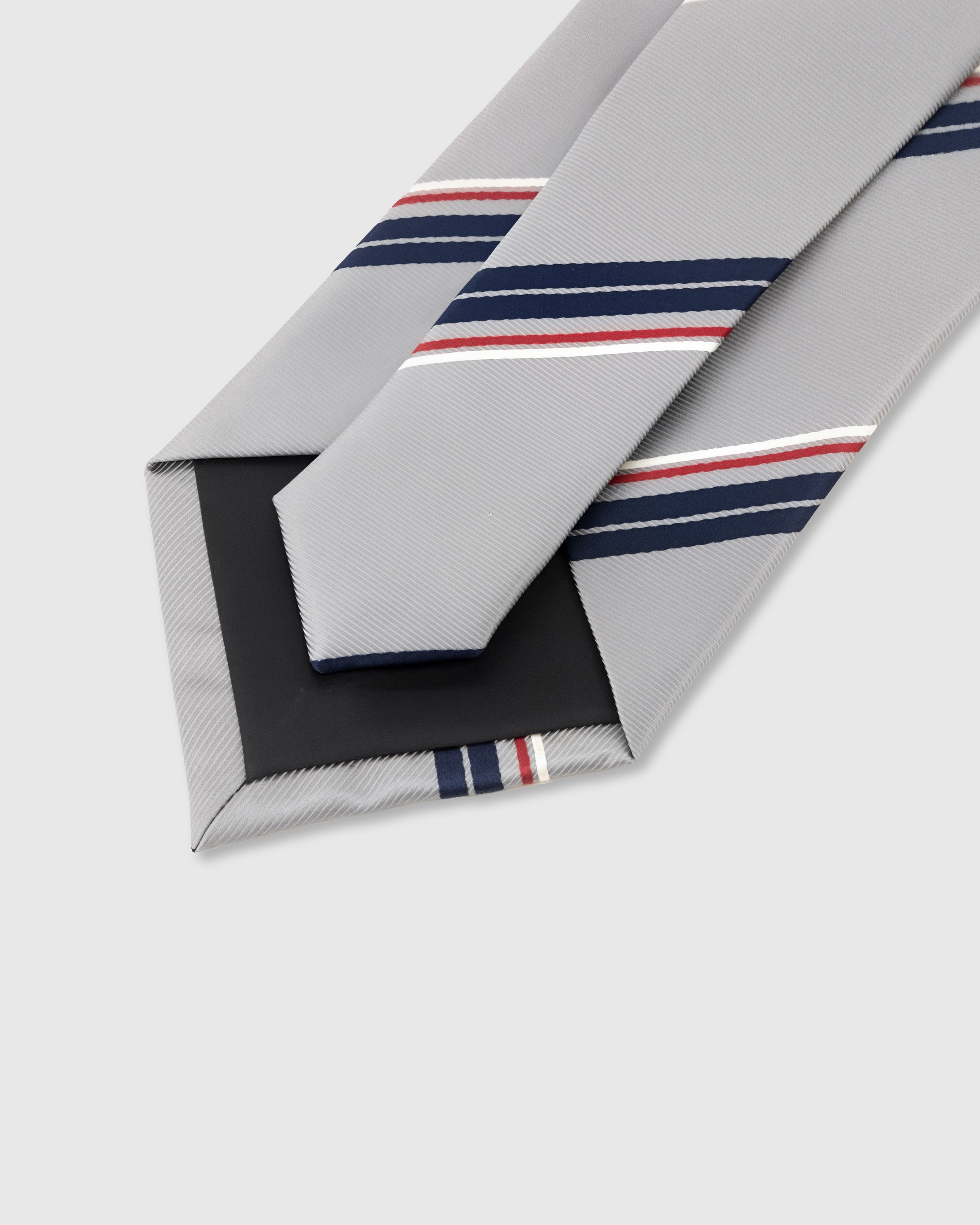 STICKYZOO Sterling Regiment Tie showing gift-ready STICKYZOO premium packaging, 145 × 8 cm, designed in Amsterdam