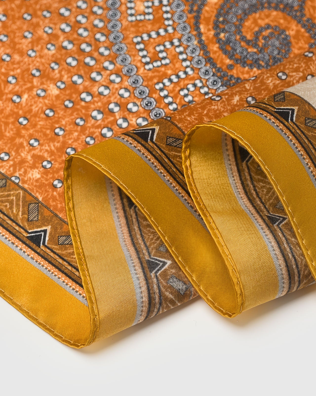 STICKYZOO gallop patchwork silk scarf with paisley medallion, rust horses on ivory, and saffron frame
```