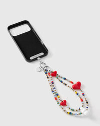 Inside of phone case showing STICKYZOO Phone Strap Card with silver hardware connection