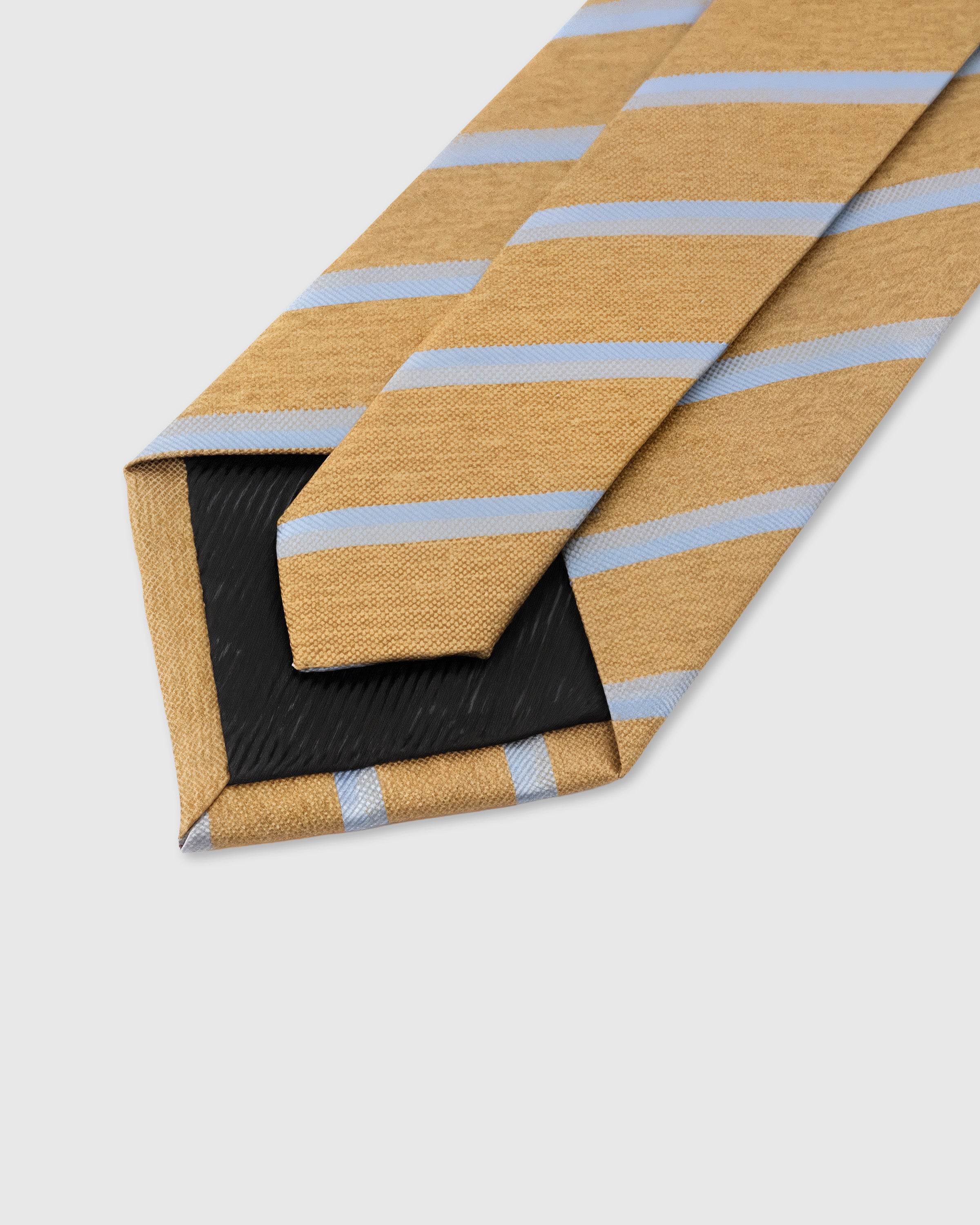 STICKYZOO Camel Sky Stripe Tie showing 45° bias-cut Italian method construction and natural silk drape, 145 × 8 cm