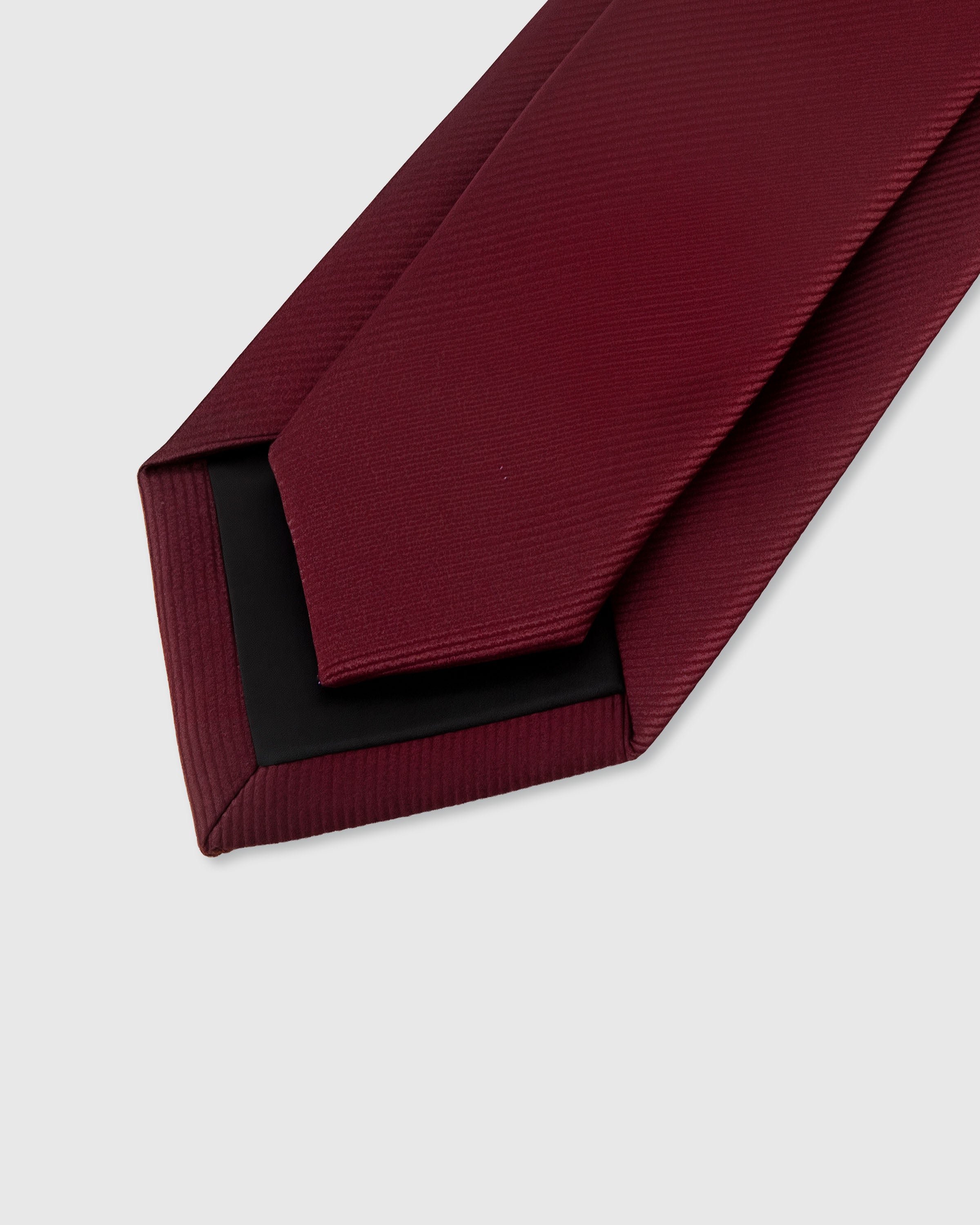 {Hand-finished interior} STICKYZOO CLARET TWILL TIE back detail showing structured interlining and hand-finished slip stitching, 145 x 8 cm