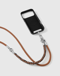 Cross-body phone strap clipped to a black phone case for hands-free carry