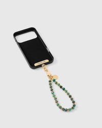 Close-up of gold-plated clasp and engraved STICKYZOO charm disc