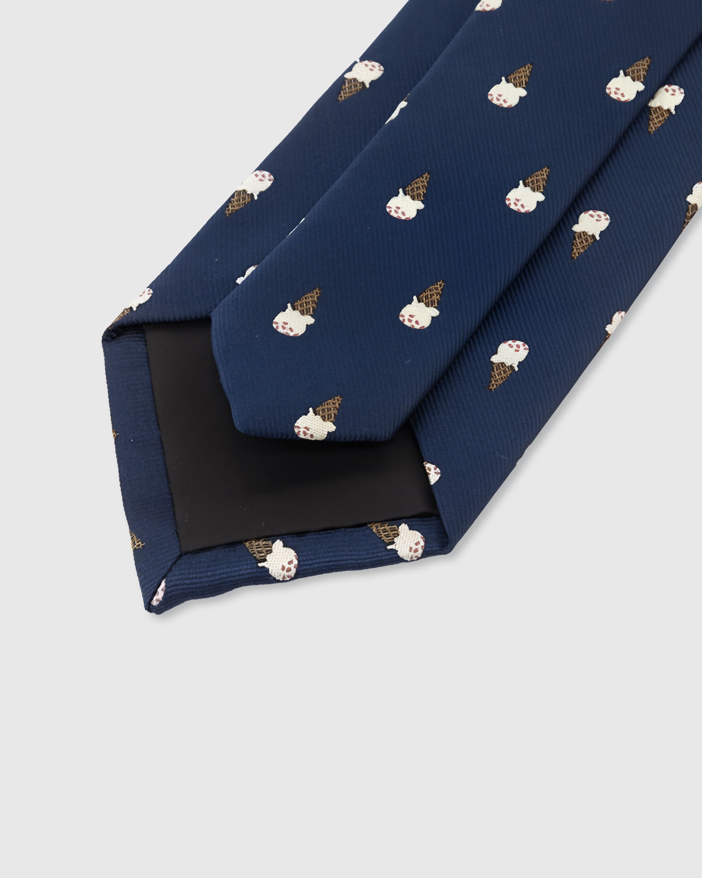 {Hand-finished interior} STICKYZOO MIDNIGHT ICE CREAM TIE back detail showing structured interlining and hand-finished slip stitching, 145 x 8 cm