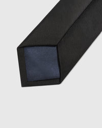 STICKYZOO NOIR HUNTER TIE back detail showing structured interlining and hand-finished slip stitching, 145 × 8 cm