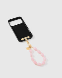 Inside of phone case showing STICKYZOO Phone Strap Card with rose agate strap attached