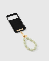 Inside of phone case showing STICKYZOO Phone Strap Card with sage agate strap attached