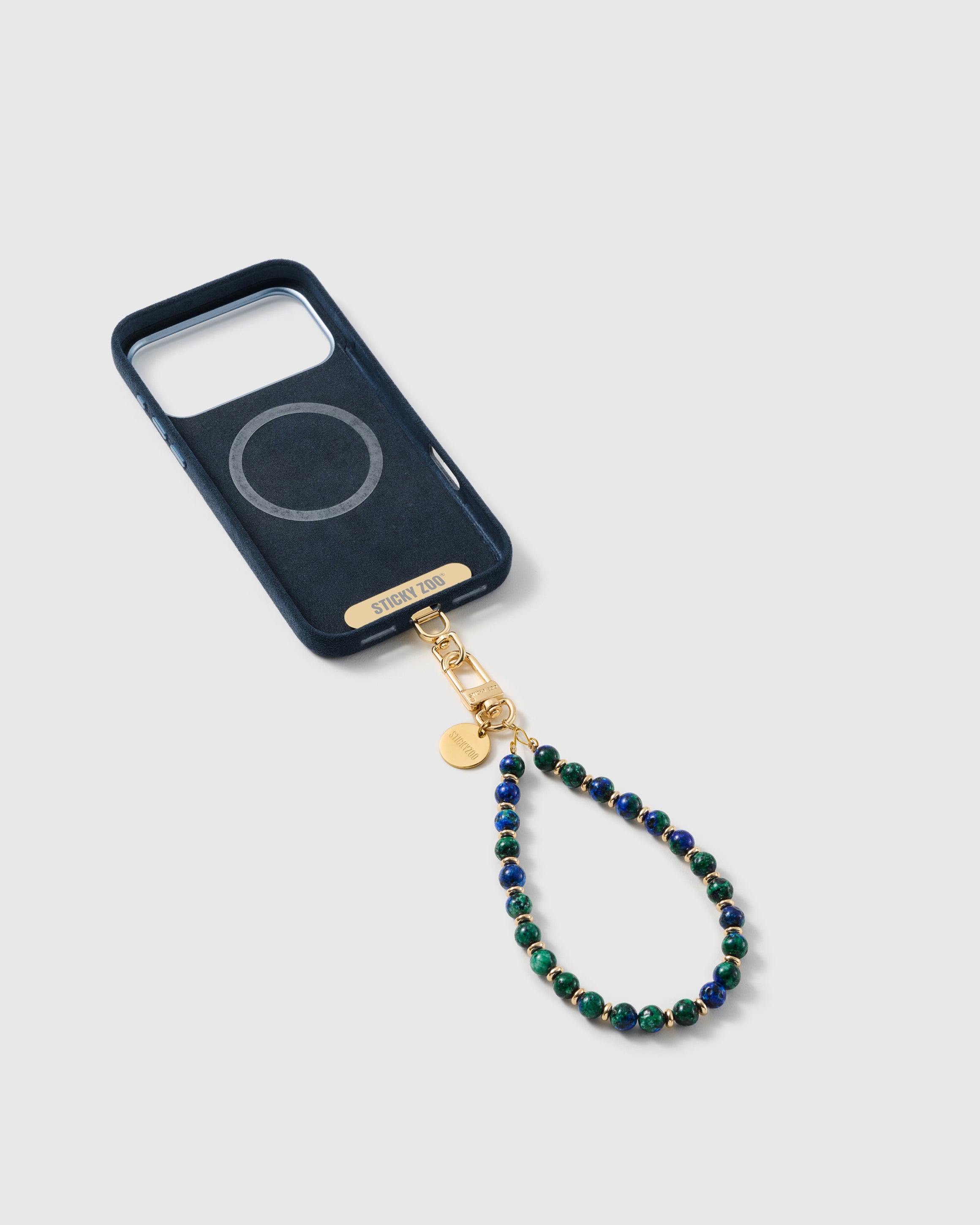 Blue-and-green stone bead strap attached to a phone case with the included Phone Strap Card