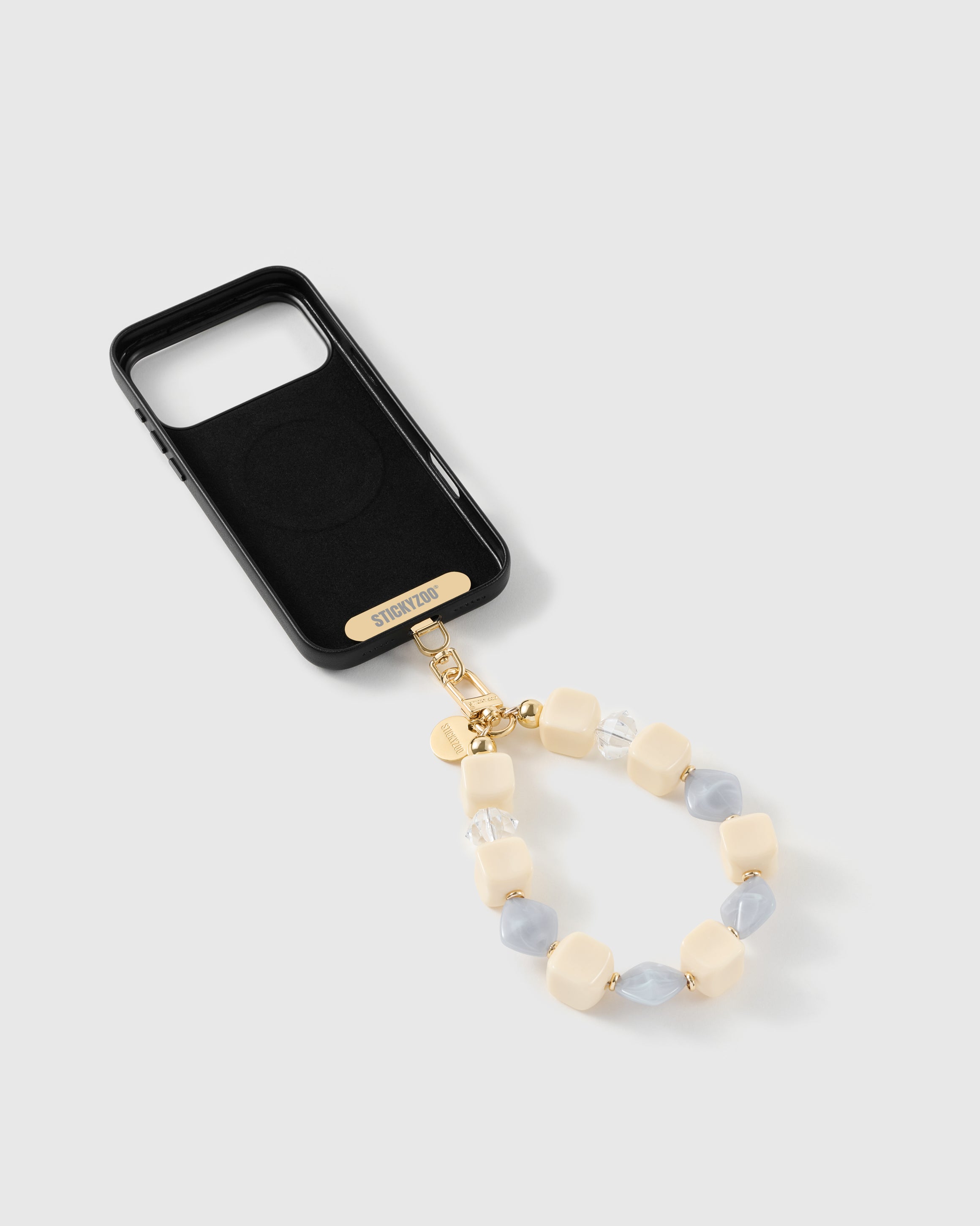 Frost bead strap attached to a phone case with the included Phone Strap Card