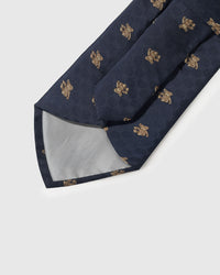 Hand-finished interior Atlas Bear Tie back view showing structured interlining and tipping on navy geometric silk weave