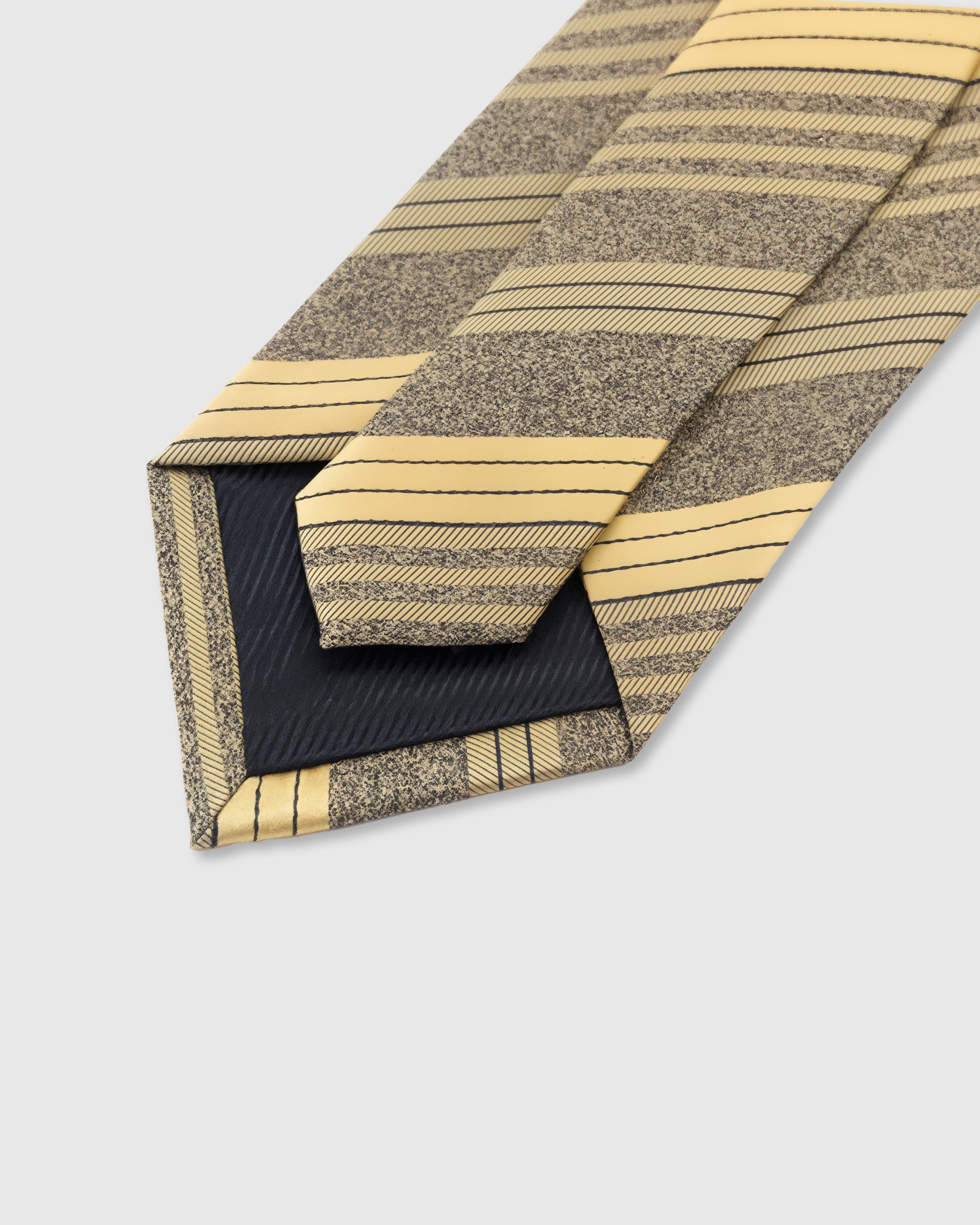 STICKYZOO Saffron Stripe Tie back detail showing structured interlining and hand-finished slip stitching, 145 × 8 cm