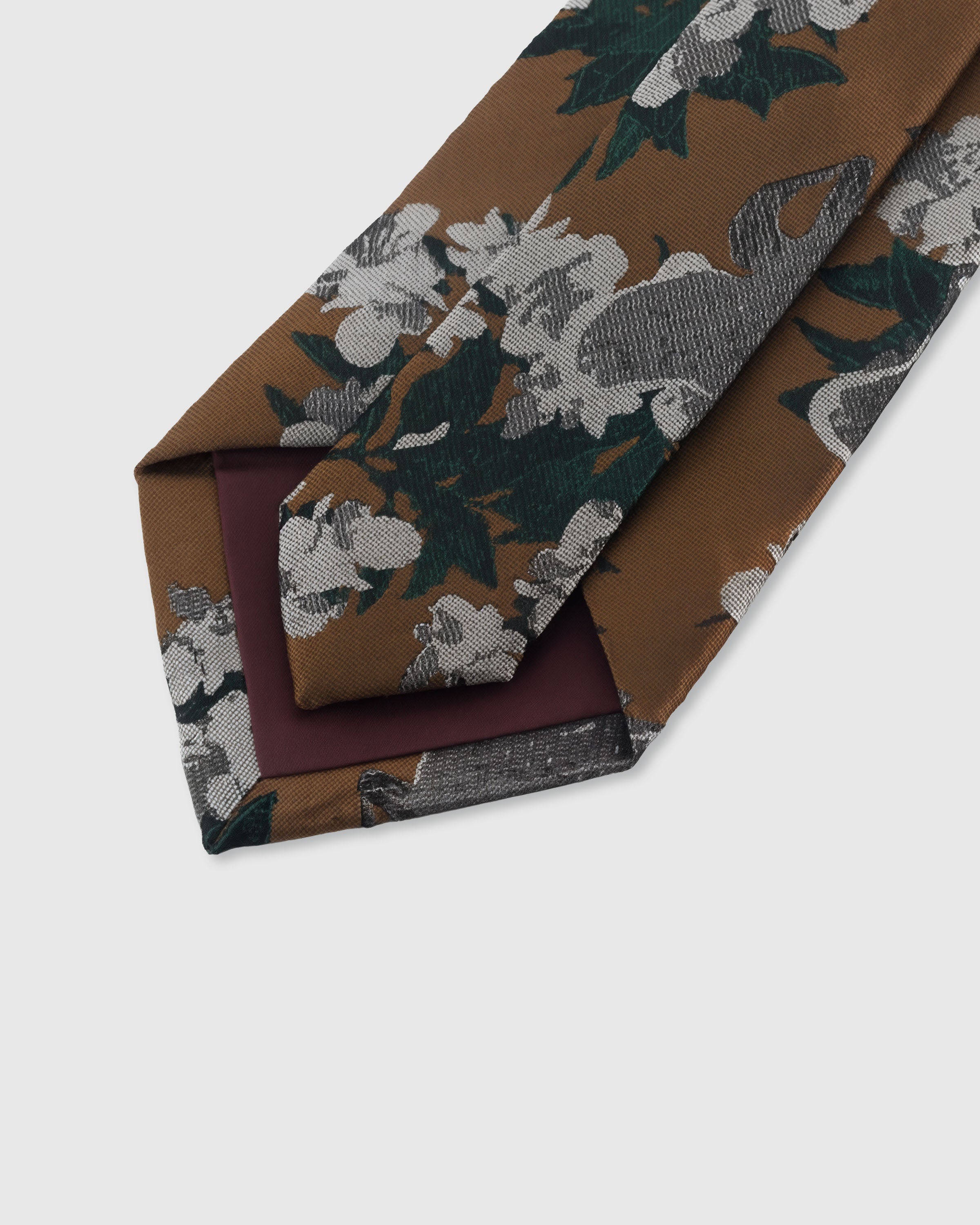 {Hand-finished interior} STICKYZOO CARAMEL FLORAL WASH TIE back detail showing structured interlining and hand-finished slip stitching, 145 x 8 cm