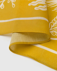 STICKYZOO mustard herbarium silk scarf edge showing the ivory border line on pure silk
