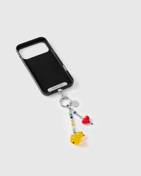 Inside of phone case showing STICKYZOO Phone Strap Card with silver hardware