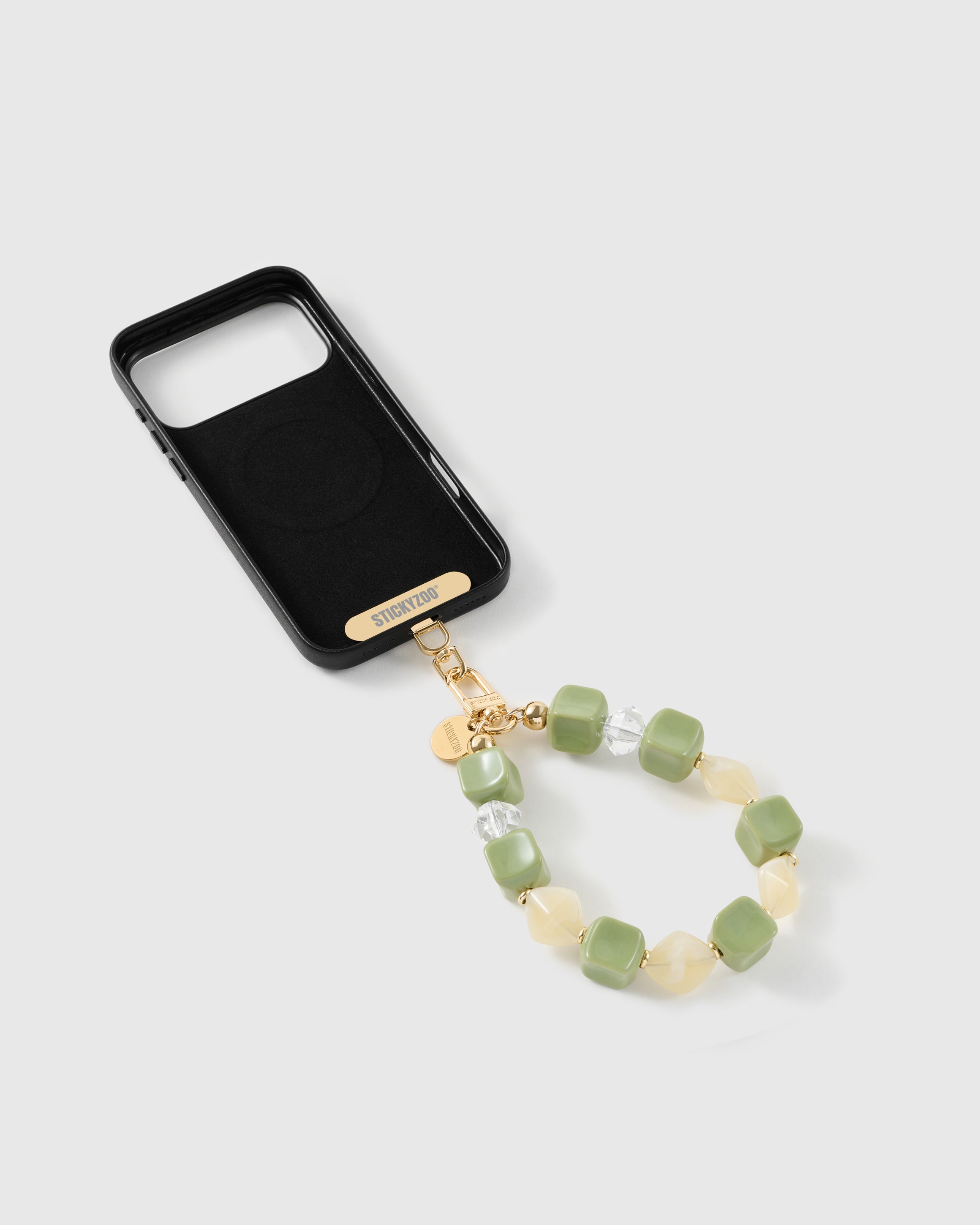 Matcha bead strap attached to a phone case with the included Phone Strap Card