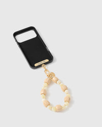 Inside of black phone case showing STICKYZOO Phone Strap Card with strap attached