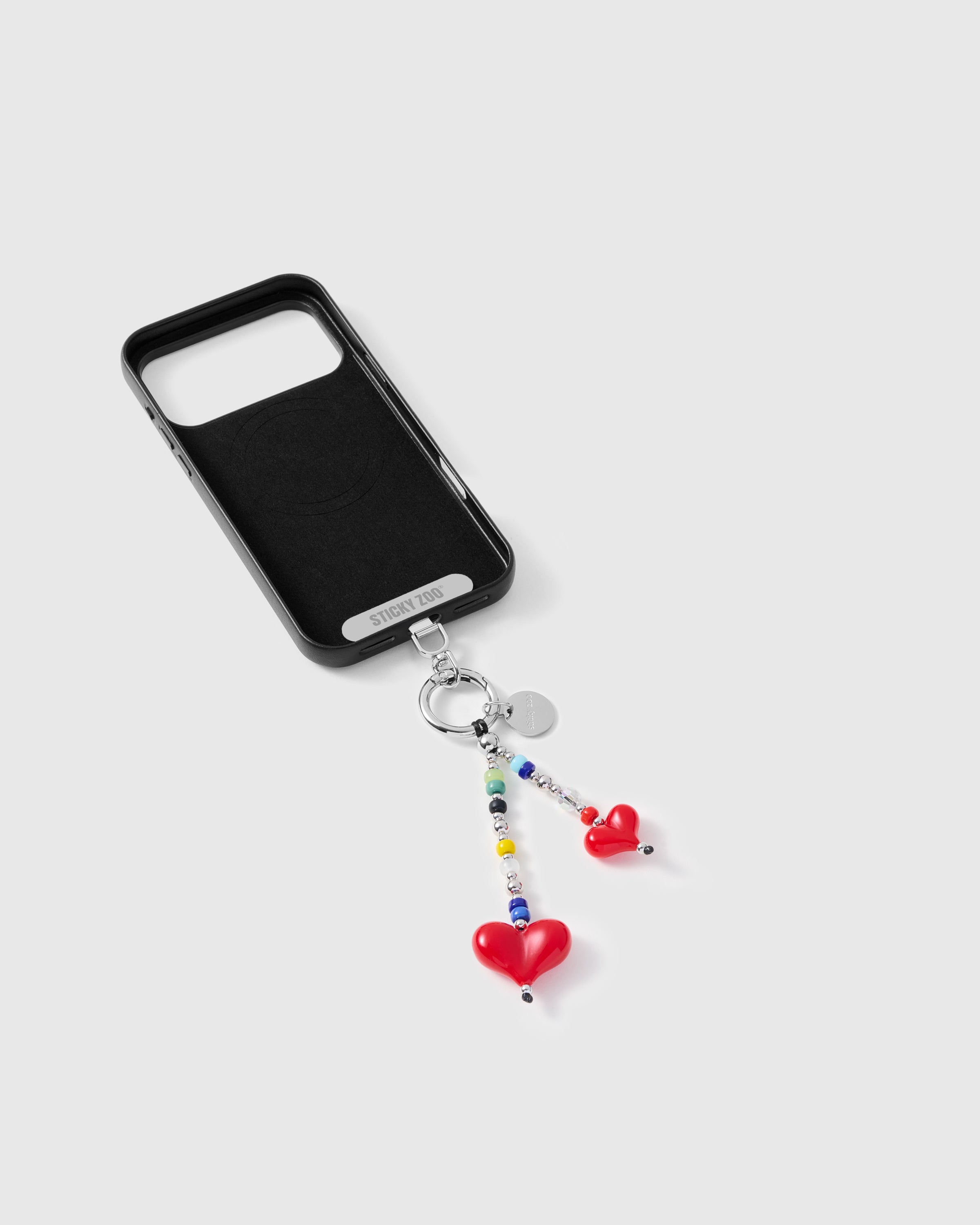 Inside of phone case showing STICKYZOO Phone Strap Card attachment slot