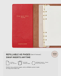 STICKYZOO red genuine goatskin notebook open showing refillable A5 ring system, 100 GSM premium paper, swap inserts anytime