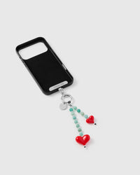 Inside of phone case showing STICKYZOO Phone Strap Card attachment slot with strap connected