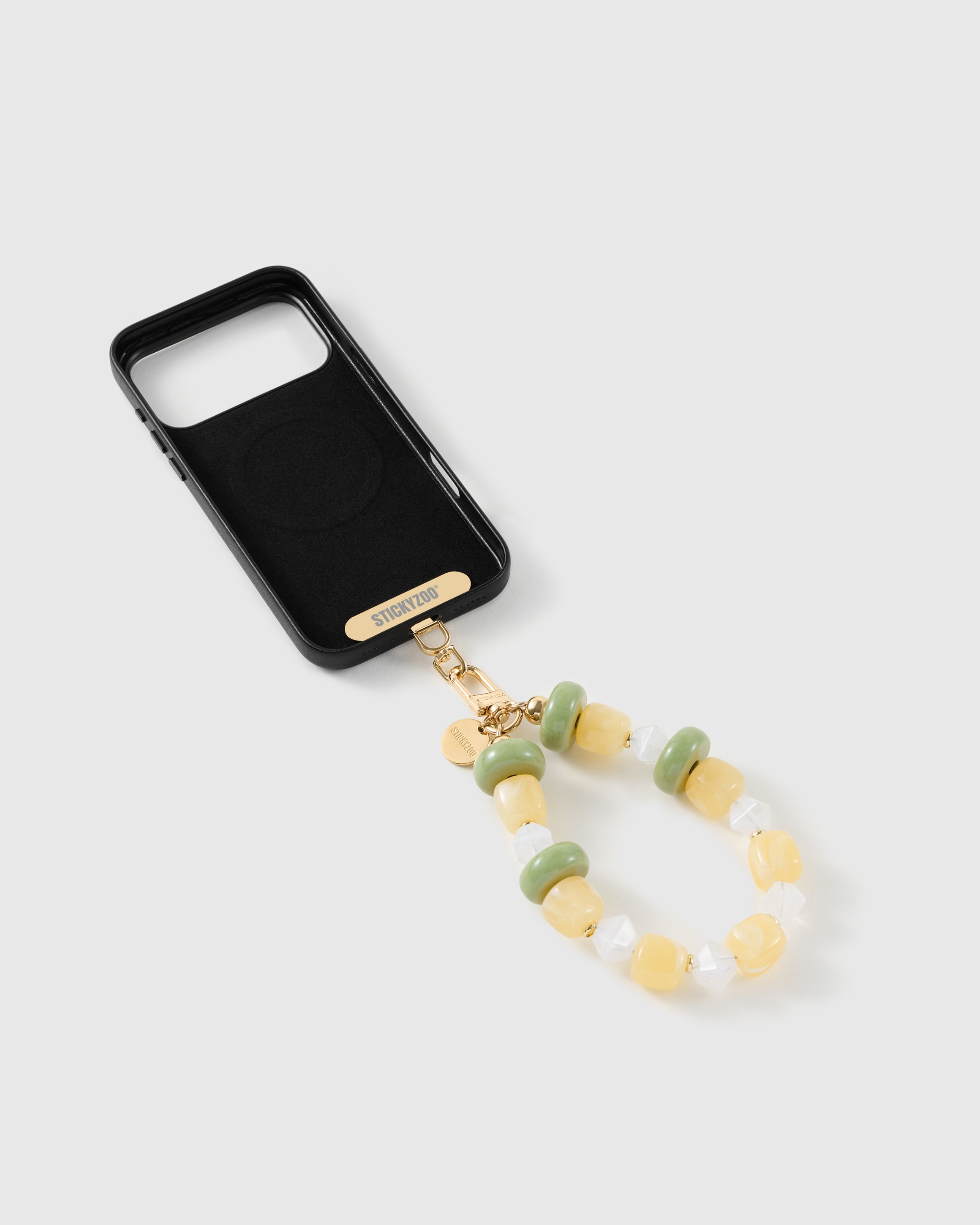 Lemon-lime bead strap attached to a phone case with the included Phone Strap Card