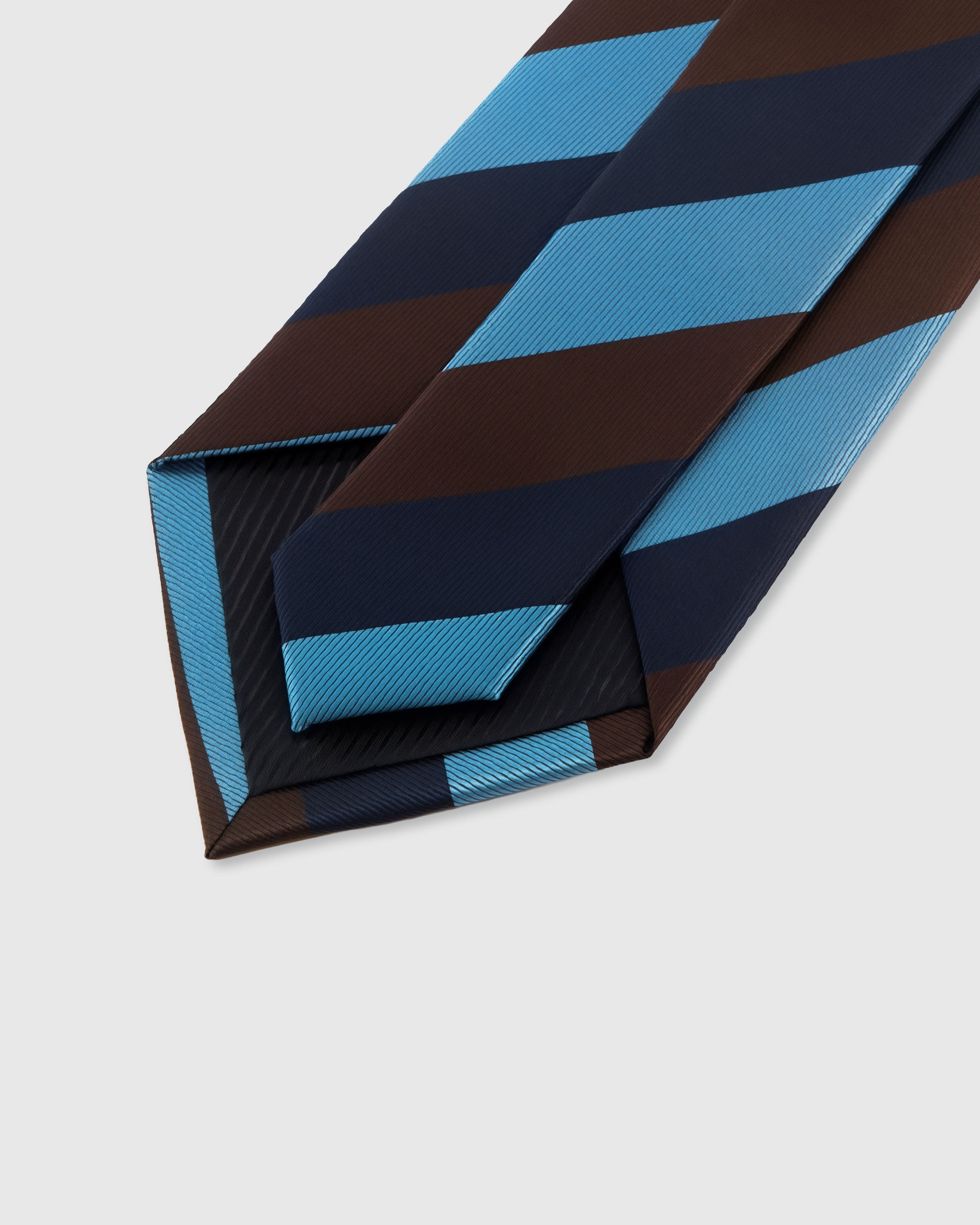 {Hand-finished interior} STICKYZOO AZURE BLOCK STRIPE TIE back detail showing structured interlining and hand-finished slip stitching, 145 x 8 cm