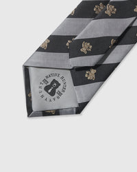 Hand-finished interior Mono Teddy Stripe Tie back view showing structured interlining on grey and navy striped mulberry silk