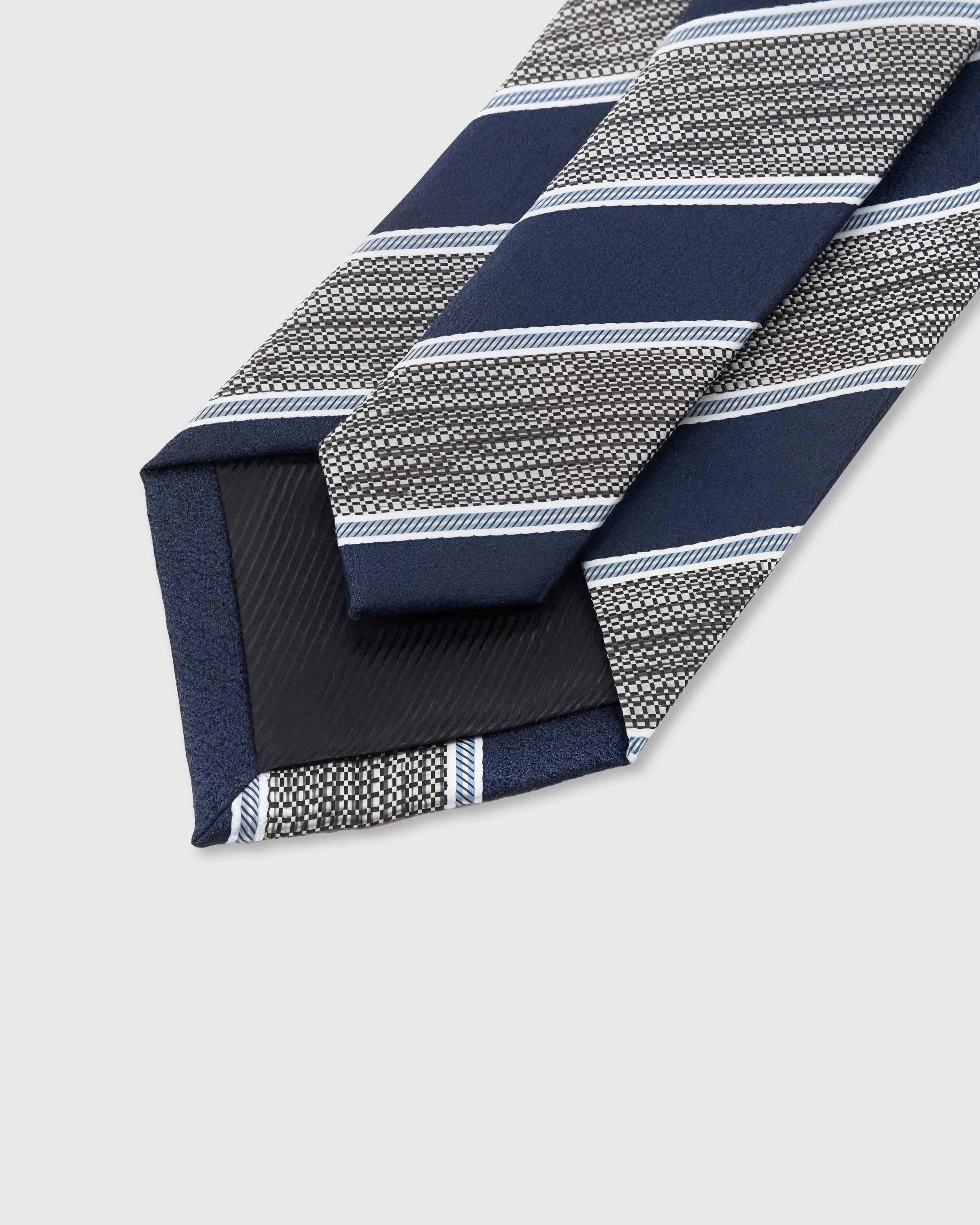 STICKYZOO Navy Silver Stripe Tie interior detail showing structured interlining and hand-finished slip stitching, 145 × 8 cm