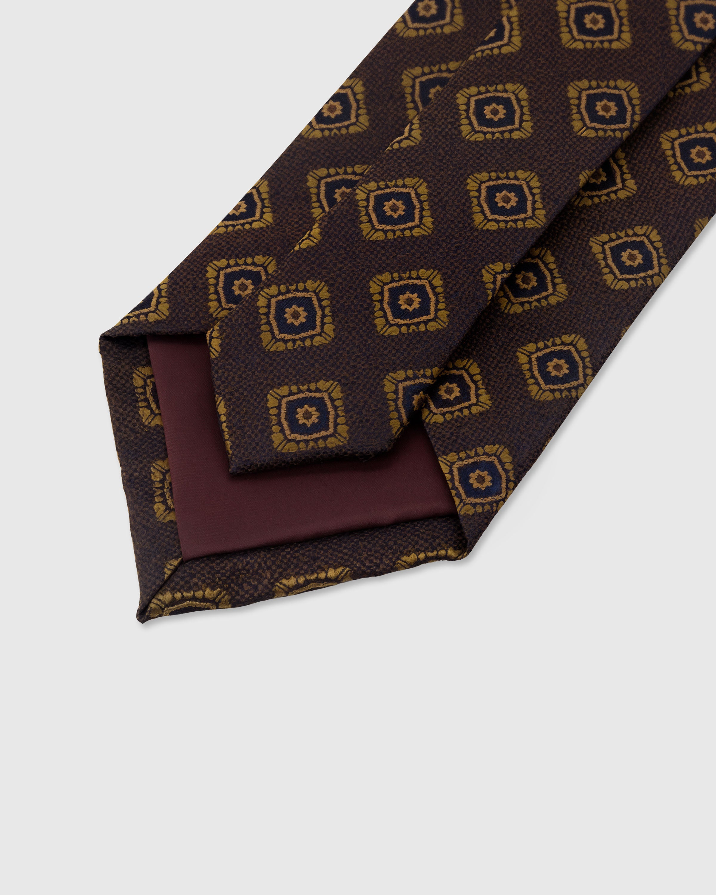 STICKYZOO Chocolate Mosaic Tie construction detail showing structured interlining and hand-finished slip stitching, 145 x 8 cm