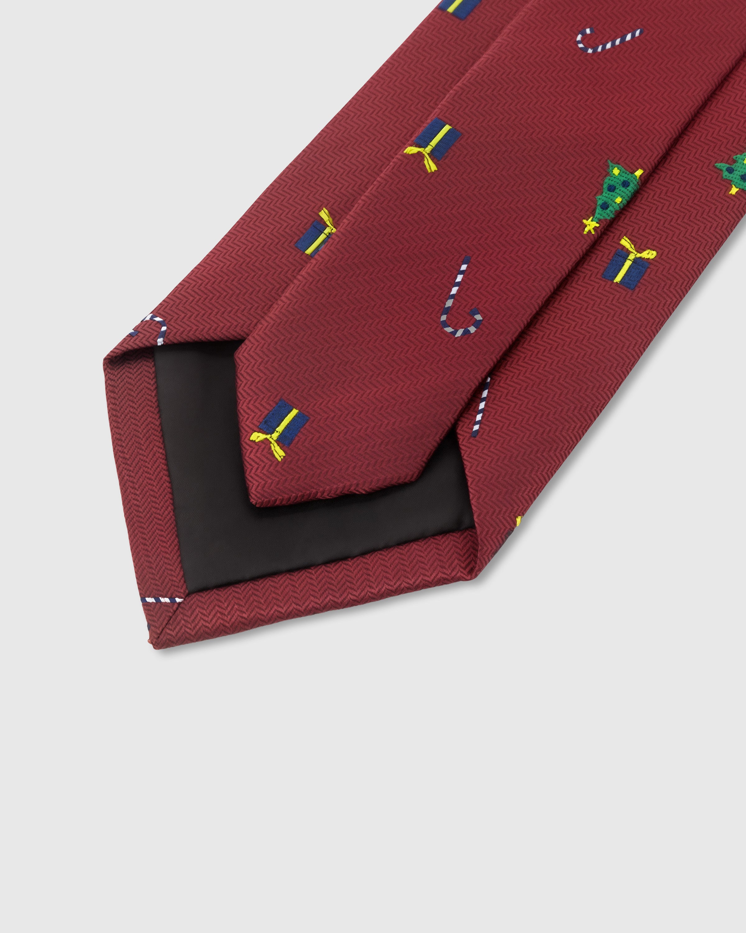 STICKYZOO Crimson Holiday Tie showing gift-ready STICKYZOO premium packaging, 145 × 8 cm, designed in Amsterdam